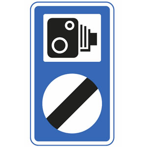 Speed camera on national speed limit road sign